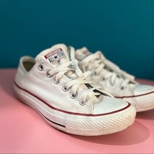 White low top Converse.